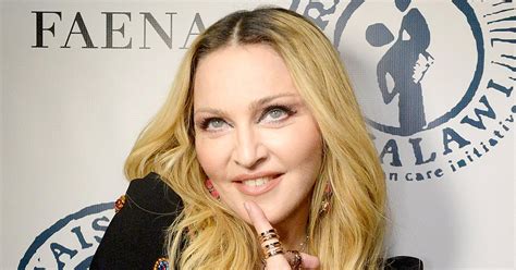 Madonna Posts Topless Selfie With Louis Vuitton Handbag